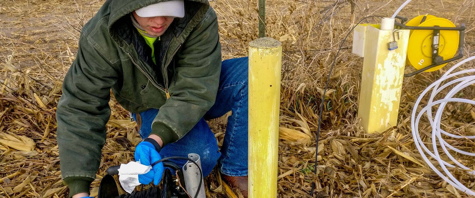 Containerizing wastewater during annual groundwater monitoring event.
